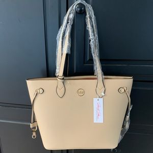 Monroe tote with clutch and shoulder bag.